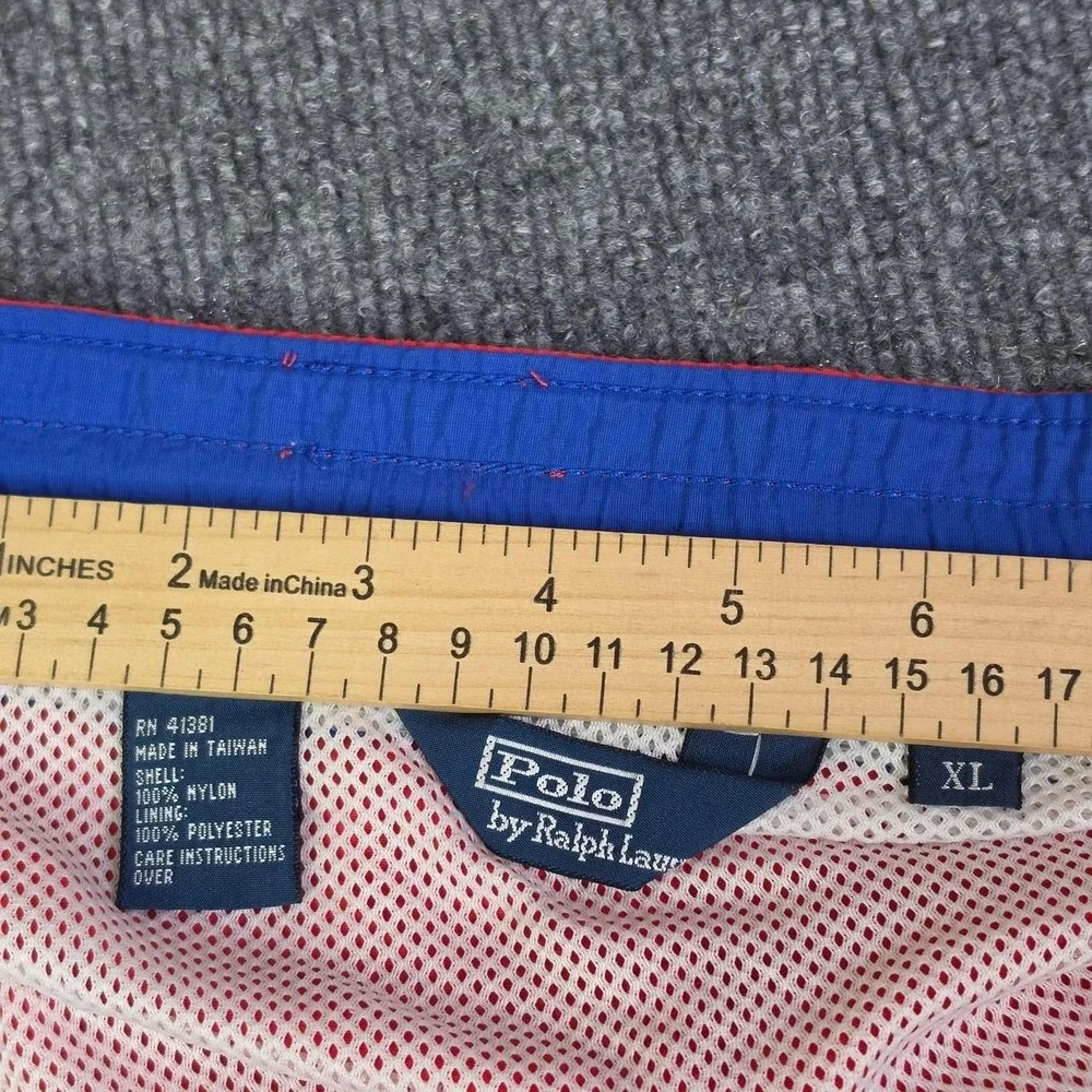 Polo Ralph Lauren orange swim shorts with blue drawstrings. Size XL.